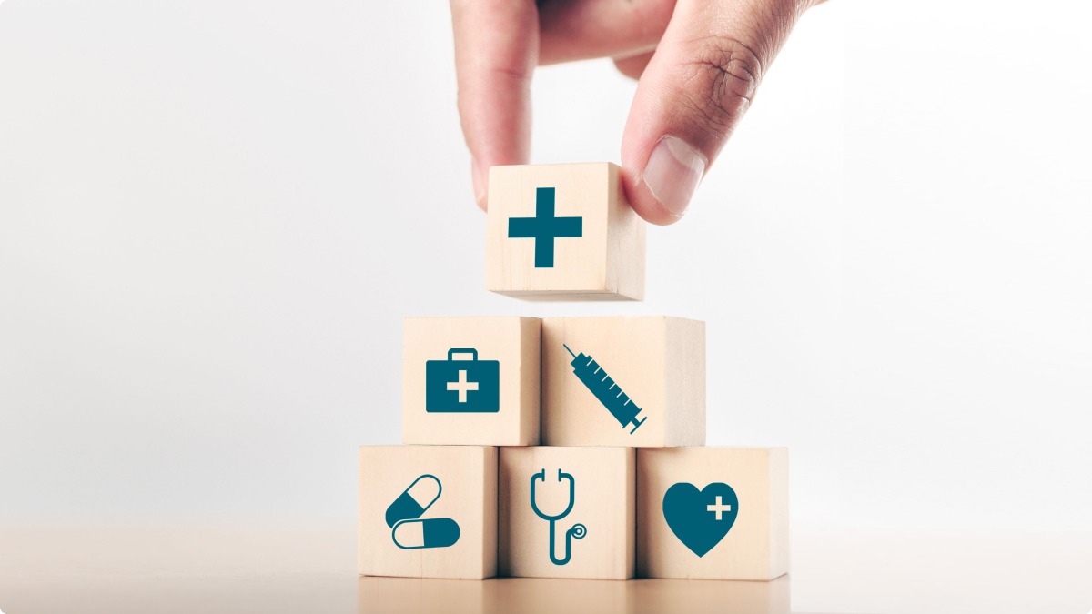 Toy wooden blocks with medical symbols on them