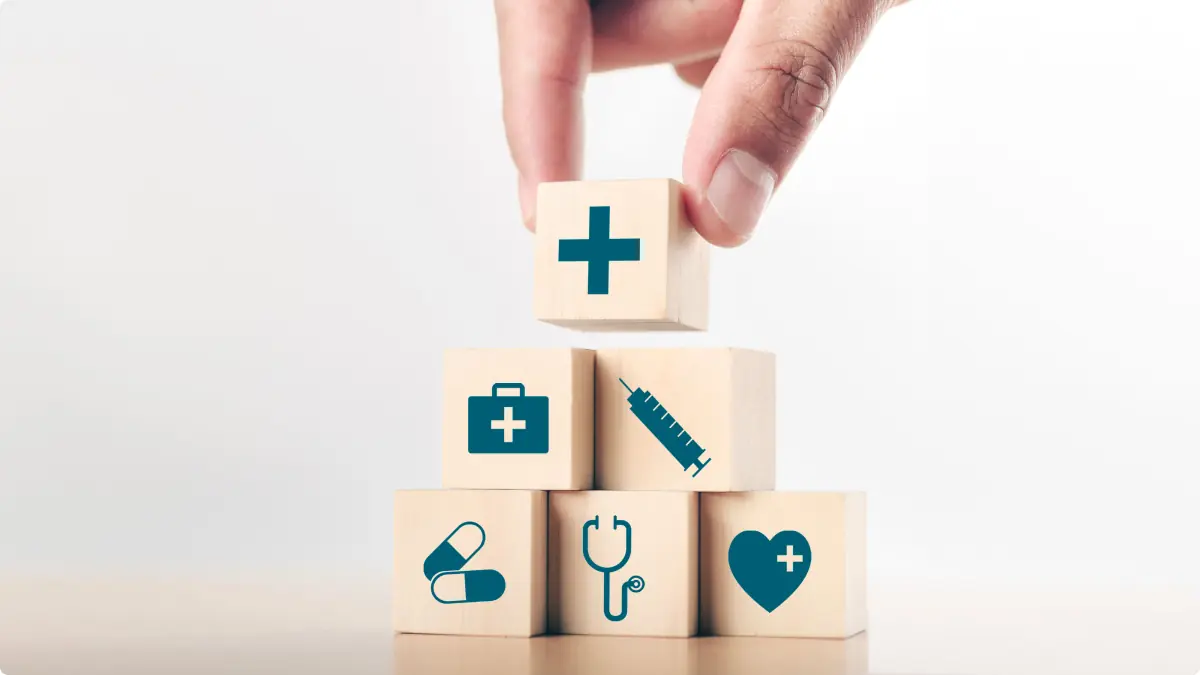 Toy wooden blocks with medical symbols on them