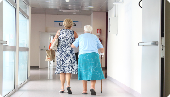 Elderly people leaving a hospital